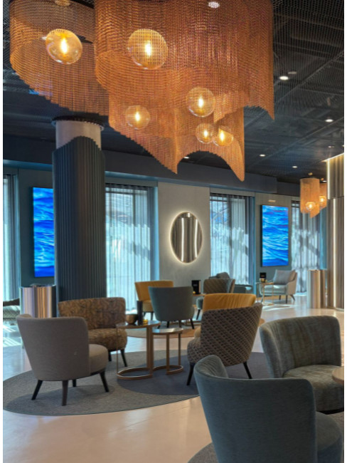 Stainless steel litter bin SN-340 in cinema lounge